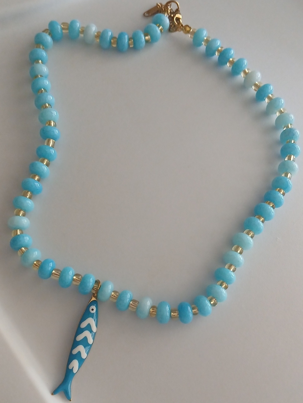 Fashion Jewelry Light Blue Bead Necklace with Gold Accents and Fish Charm